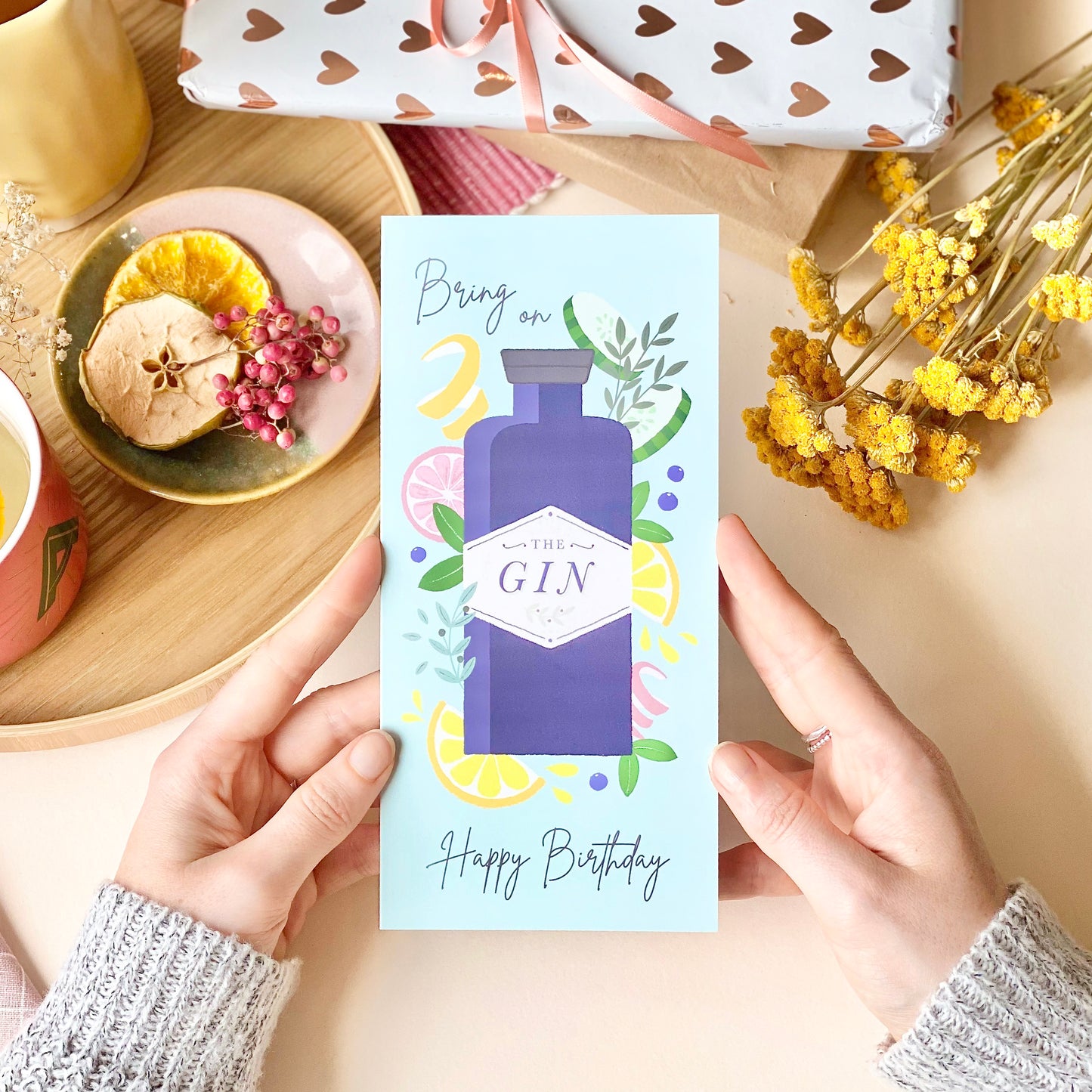 Bring On the Gin Birthday Card in hands designed by Rodo Creative