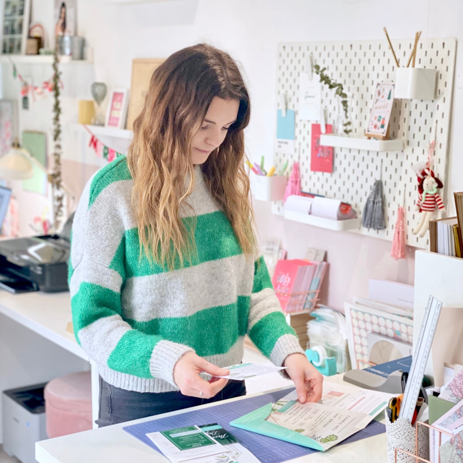 Becky at Rodo Creative packing greeting card, scratch card and voucher gift orders